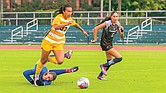 Y-Van Nguyen, left, fights off an opponent’s attempt to slow her pace as VCU extended its unbeaten streak to five games in the 1-1 draw against St. Bonaventure at Sports Backers Stadium.