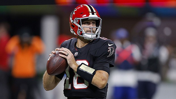 Atlanta Falcons quarterback Kirk Cousins looks to throw a pass against the Tampa Bay Buccaneers at Mercedes-Benz Stadium.
Mandatory Credit:	Todd Kirkland/Getty Images via CNN Newsource