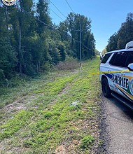 The scene where William Nicholas Abraham's body was found in a tarp is seen along Highway 51 in Tangipahoa Parish, Louisiana.
Mandatory Credit:	Tangipahoa Parish Sheriff's Office via CNN Newsource