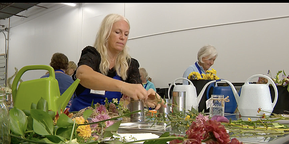 A Twin Cities floral shop is making a meaningful impact in the fight against senior loneliness by using flowers to …