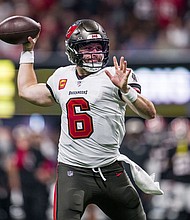 The Buccaneers, led by quarterback Baker Mayfield, are leaving for New Orleans on October 8.
Mandatory Credit:	Danny Karnik/AP via CNN Newsource