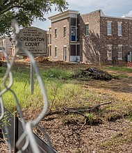 Construction continues on Nine Mile Road in Richmond’s East End, where crews are preparing
land for new townhouses and apartments. The development will replace 504 public housing units
in Creighton Court with 626 apartments and 105 townhouses. The city provided $21.4 million
for infrastructure, with Richmond Redevelopment and Housing Authority agreeing to cap the
number of low-income residents in the new development.