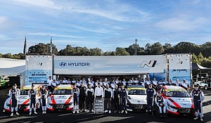 Hyundai team members are photographed after securing the Manufacturers’ Championship at Michelin Raceway Road Atlanta in Braselton, Ga., Oct. 11, 2024. (Photo/Bryan Herta Autosport/LAT)