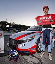 No. 77 Hyundai Elantra N TCR driver Bryson Morris is photographed during the pole ceremony for the Fox Factory 120 at Michelin Raceway Road Atlanta in Braselton, Ga., Oct. 11, 2024. (Photo/Bryan Herta Autosport/LAT)