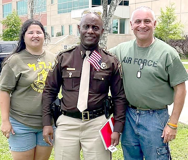 Sandra Levine, Sherrif Eric Fegan, and Burt Levine