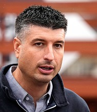 In this November 2022 photo, Tom Barrett attends a campaign rally in Benton Township, Michigan. Black state lawmakers in Michigan have called on the state’s attorney general and a county prosecutor to investigate Barrett, a GOP candidate for the US House, over a newspaper advertisement in a Black-owned newspaper that listed the wrong date for Election Day.
Mandatory Credit:	Carlos Osorio/AP/File via CNN Newsource