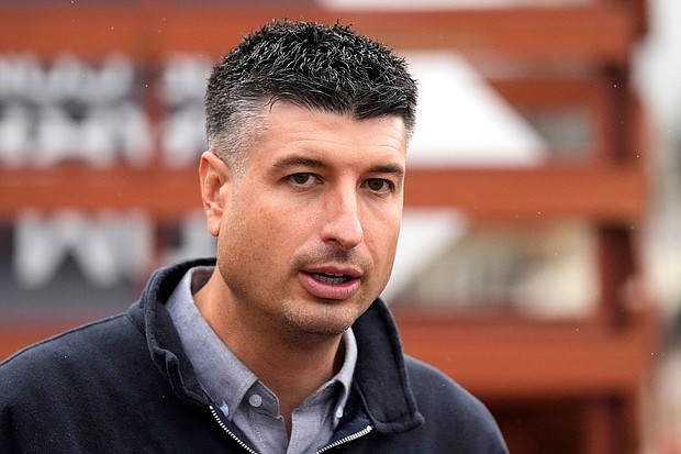 In this November 2022 photo, Tom Barrett attends a campaign rally in Benton Township, Michigan. Black state lawmakers in Michigan have called on the state’s attorney general and a county prosecutor to investigate Barrett, a GOP candidate for the US House, over a newspaper advertisement in a Black-owned newspaper that listed the wrong date for Election Day.
Mandatory Credit:	Carlos Osorio/AP/File via CNN Newsource