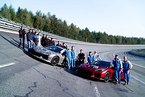 Members of the Corvette team, including General Motors President Mark Reuss on the track in Papenburg, Germany. Preproduction models shown. Actual production model may vary.