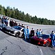 Members of the Corvette team, including General Motors President Mark Reuss on the track in Papenburg, Germany. Preproduction models shown. Actual production model may vary.