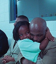 A scene from the documentary “Daughters,” about the relationships between a group of incarcerated men and their daughters.