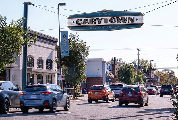 The new Carytown sign, installed above Cary Street near Kroger, marks the entrance to the shopping district. The project, completed after a two-year collaboration between the city, Carytown Merchants Association and 5th District Councilperson Stephanie Lynch, is suspended approximately 25 feet overhead.