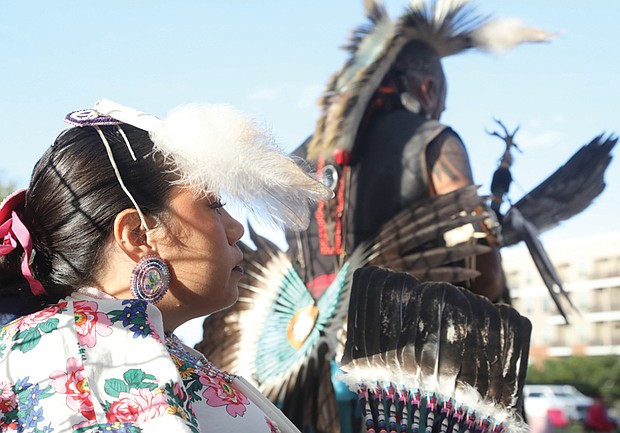 Ashton Montez, 32, of the Chickahominy Tribe in Charles City, takes a break after performing at the Pocahontas Project’s Indigenous Peoples’ Day celebration. The event, held Monday, Oct. 14, at Powhatan Hill Park in Richmond,
showcased Virginia’s tribal cultures. Montez, who works as the Tribal nurse, performed on the park’s baseball field, which served as a stage for the event.