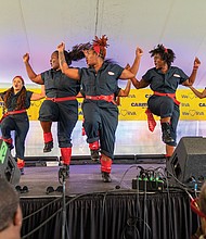 The Richmond Alumnae Chapter Delta Sigma Theta Sorority Step Team, performs in the “Stepping Back” step team competition at the CarMax Stage during the Richmond Folk Festival’s 20th anniversary on Saturday, Sept. 28.