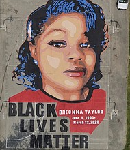 A ground mural depicting a portrait of Breonna Taylor is seen in July 2020 at Chambers
Park in Annapolis, Md.