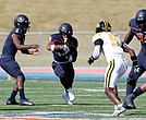 Virginia State University’s offense dominates during their 38-17 homecoming win against Bowie State. Running back Jimmyll Williams (#28) charges up the field as the Trojans amassed 457 yards of total offense.