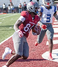 Virginia Union University tight end Kalen Carver (#80) hauls in his first touchdown of the day during the Panthers’ 35-0 victory over Elizabeth City State at Hovey Stadium. Carver’s two touchdown catches helped lead to its second consecutive shutout over the Vikings.