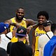 Los Angeles Lakers' LeBron James, left, and his son, Bronny James, could make history Tuesday as first father-son duo to play together in a regular season NBA game.
Mandatory Credit:	Jae C. Hong/AP via CNN Newsource