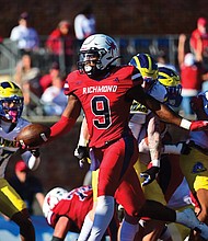 Richmond’s Quantraill Morris-Walker (#9) makes a key defensive play during the Spiders’ 28-9 victory over Delaware on Saturday. Richmond’s defense forced multiple turnovers and held the previously undefeated Blue Hens to their lowest point total of the season.