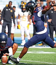 Virginia State kicker Joshua Campbell delivers as the Trojans extended their lead in a dominant win over Elizabeth City State.