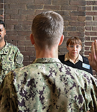 Musicians 1st Class Rajesh Soodeen, from Houston, TX, and Jordyn Rueda, from Independence, MO