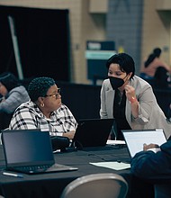 Job seekers connect with potential employers at the Reform Alliance and Roc Nation Job Fair at the Greater Richmond Convention Center last week.