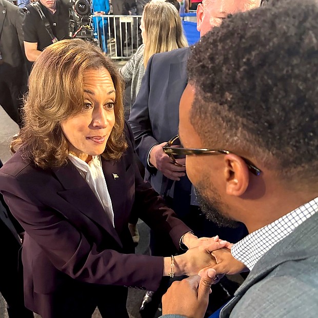 Kamala Harris speaking with Dexter McCoy