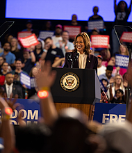 Kamala Harris at the podium at Shell Stadium for her Houston Mega Rally.