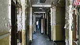 The condition of a dilapidated hallway inside the former Richmond Community Hospital, as seen in 2019.