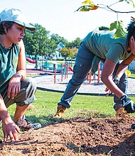 Members of South ReLeaf during a recent tree-planting event at James H. Blackwell Elementary School.