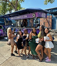 Erica Banks and the lucky winner along with friends