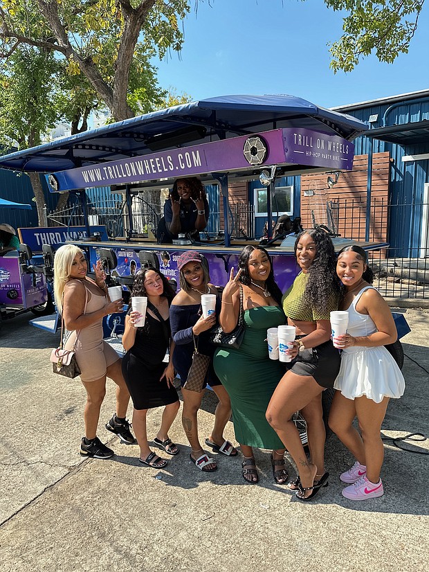 Erica Banks and the lucky winner along with friends