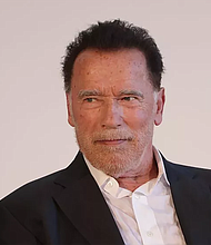 Former California Gov. Arnold Schwarzenegger endorses Kamala Harris for president, voicing his concerns about the country’s direction. Image courtesy of Getty Images.