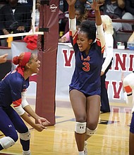 Virginia State players celebrate a key point during a recent match. The Trojans’ teamwork led them to a weekend sweep over Lincoln and Shaw, snapping Shaw’s conference winning streak.