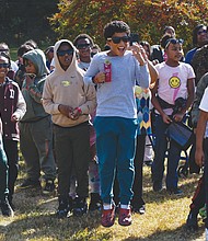 Miles Jones Elementary students react as a Virginia Army National Guard helicopter lands on school grounds during Red Ribbon Week celebrations on Oct. 29.