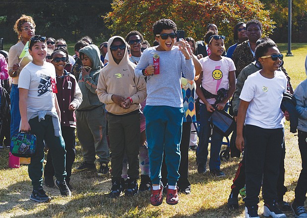 Miles Jones Elementary students react as a Virginia Army National Guard helicopter lands on school grounds during Red Ribbon Week celebrations on Oct. 29.