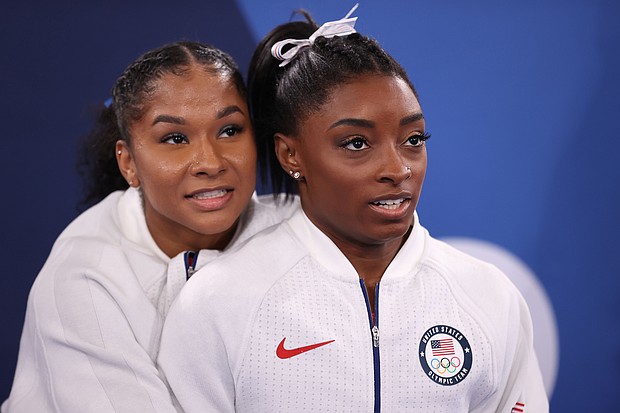 Three years earlier, Jordan Chiles and Simone Biles look on during the same event in July 2021, at the Tokyo Olympics.
Mandatory Credit:	Laurence Griffiths/Getty Images via CNN Newsource