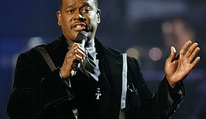 Luther Vandross sings at the 29th American Music Awards in Los Angeles January 9, 2002.
Mandatory Credit:	Mike Blake/Reuters via CNN Newsource