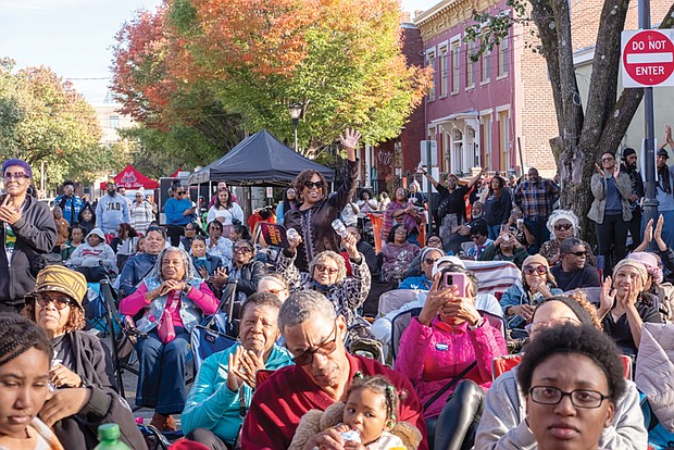 Hundreds attend the block party celebration on 1st Street between Clay and Marshall to commemorate Mama J’s restaurant’s 15 years in Jackson Ward.