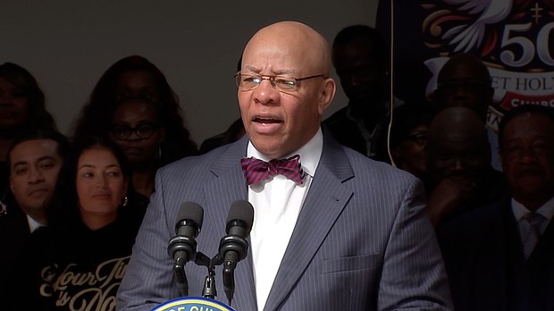 The Rev. Mitchell Johnson, then the president of the Chicago Board of Education, speaks during a news conference on October 7 in Chicago.
Mandatory Credit:	WLS via CNN Newsource