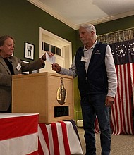A man votes in the 2024 presidential election on Election Day in Dixville Notch, New Hampshire, on Tuesday, November 5.
Mandatory Credit:	Reba Saldanha/Reuters via CNN Newsource
