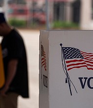 A voter casts ballot during the early voting process at a polling station ahead of the upcoming 2024 presidential election on October 27, in Los Angeles.
Mandatory Credit:	Qian Weizhong/VCG/AP via CNN Newsource