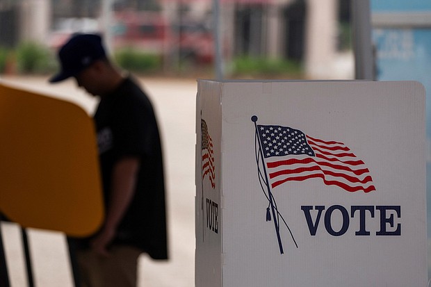 A voter casts ballot during the early voting process at a polling station ahead of the upcoming 2024 presidential election on October 27, in Los Angeles.
Mandatory Credit:	Qian Weizhong/VCG/AP via CNN Newsource