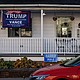 A Trump/Vance campaign flag hangs in front of one side of a duplex home while a Harris/Walz campaign sign is seen in front of the other side in Pen Argyl, Pennsylvania on November 2.
Mandatory Credit:	Samuel Corum/AFP/Getty Images via CNN Newsource