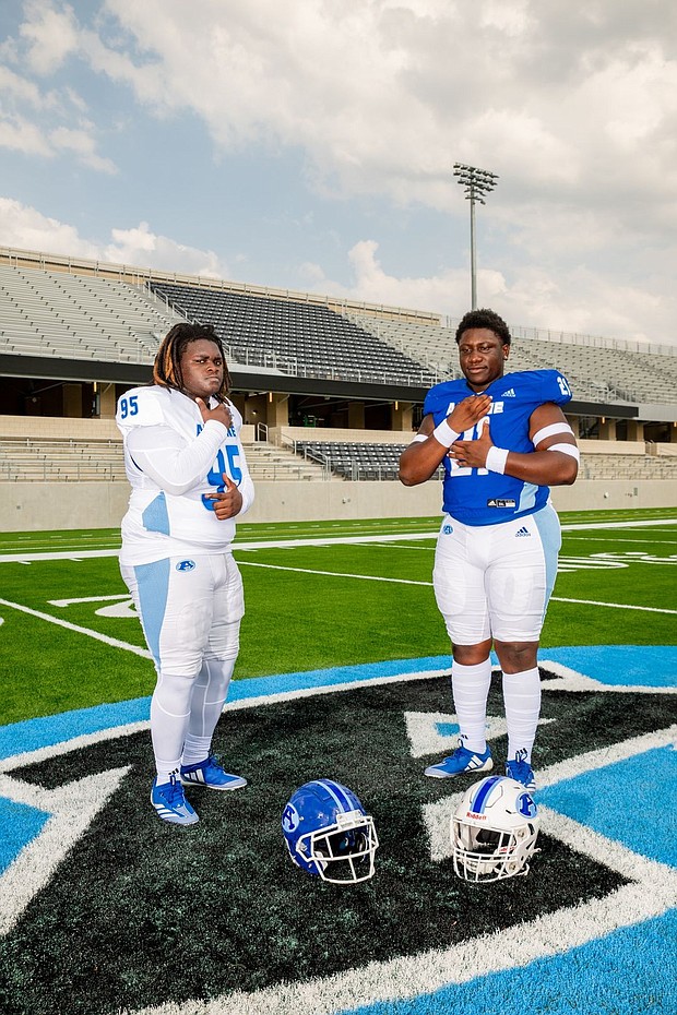 Aldine Mustangs' Keishon Wiser and Dereon Williams