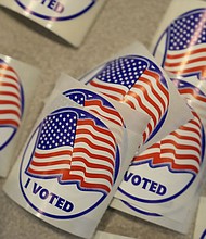 Stickers are seen at a Voter Services satellite office at the Chester County Government Services Center ahead of the 2024 General Election in the United States, Friday, October 25, in West Chester, Pennsylvania.
Mandatory Credit:	Matt Slocum/AP via CNN Newsource