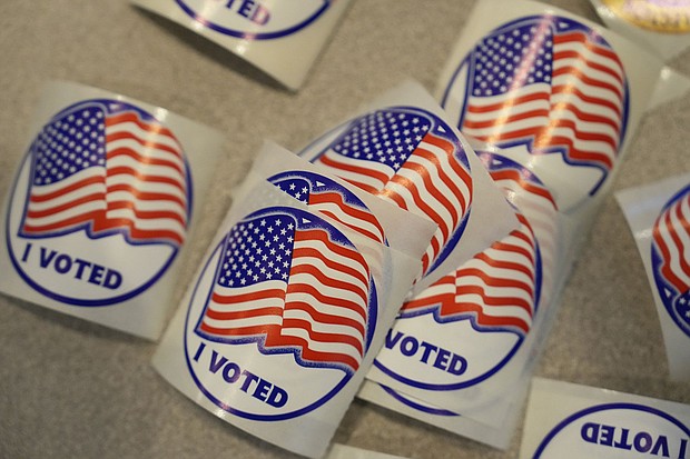 Stickers are seen at a Voter Services satellite office at the Chester County Government Services Center ahead of the 2024 General Election in the United States, Friday, October 25, in West Chester, Pennsylvania.
Mandatory Credit:	Matt Slocum/AP via CNN Newsource