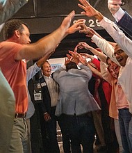 Danny Avula’s supporters welcome him at The Broadberry to celebrate during his election night watch party.
