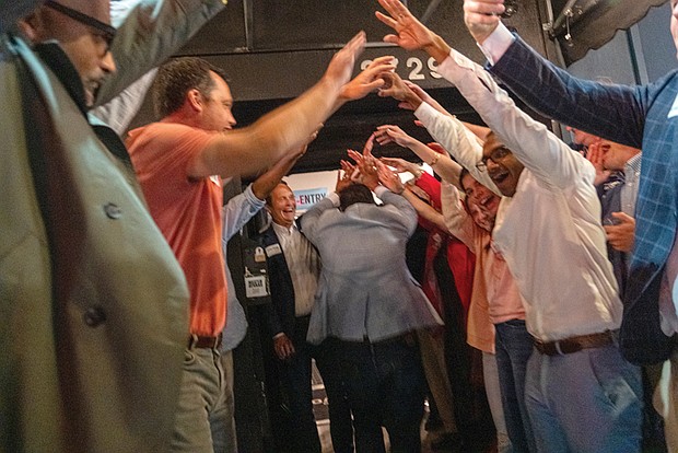 Danny Avula’s supporters welcome him at The Broadberry to celebrate during his election night watch party.