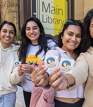 RVA Votes stickers in hand, VCU graduate students (from right) Nicki Patel, Goonja Shah, Tulsi Mehta, and Tania Gupta, stand outside Richmond’s Main Public Library after voting on Election Day. Three of them utilized Virginia’s same-day registration after recently moving to the state for school.