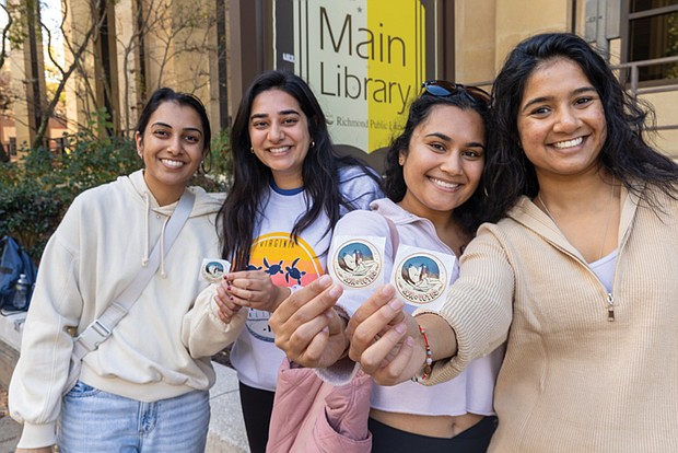 RVA Votes stickers in hand, VCU graduate students (from right) Nicki Patel, Goonja Shah, Tulsi Mehta, and Tania Gupta, stand outside Richmond’s Main Public Library after voting on Election Day. Three of them utilized Virginia’s same-day registration after recently moving to the state for school.